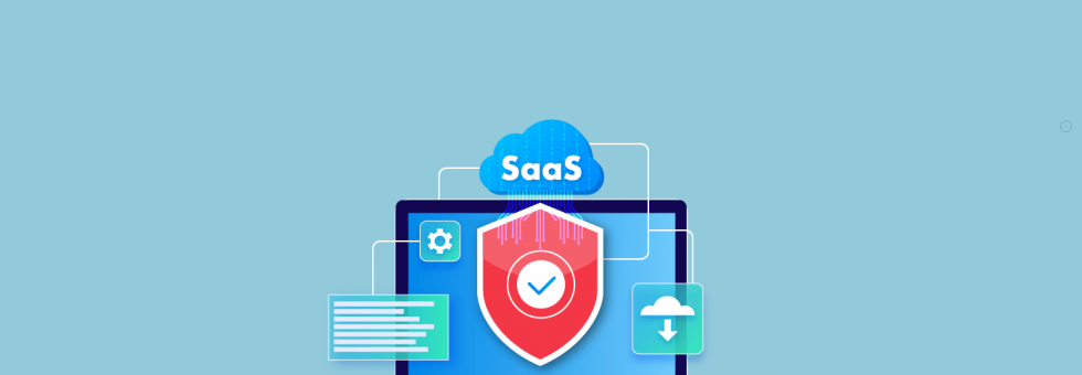 A professional team reviewing SaaS security certification documents on a laptop.